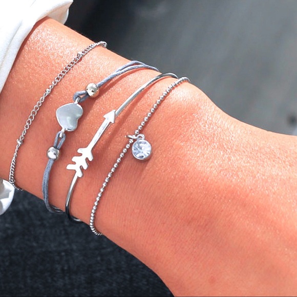 Jewelry - Set of 4 Silver/Gray Cupid Themed Bracelets